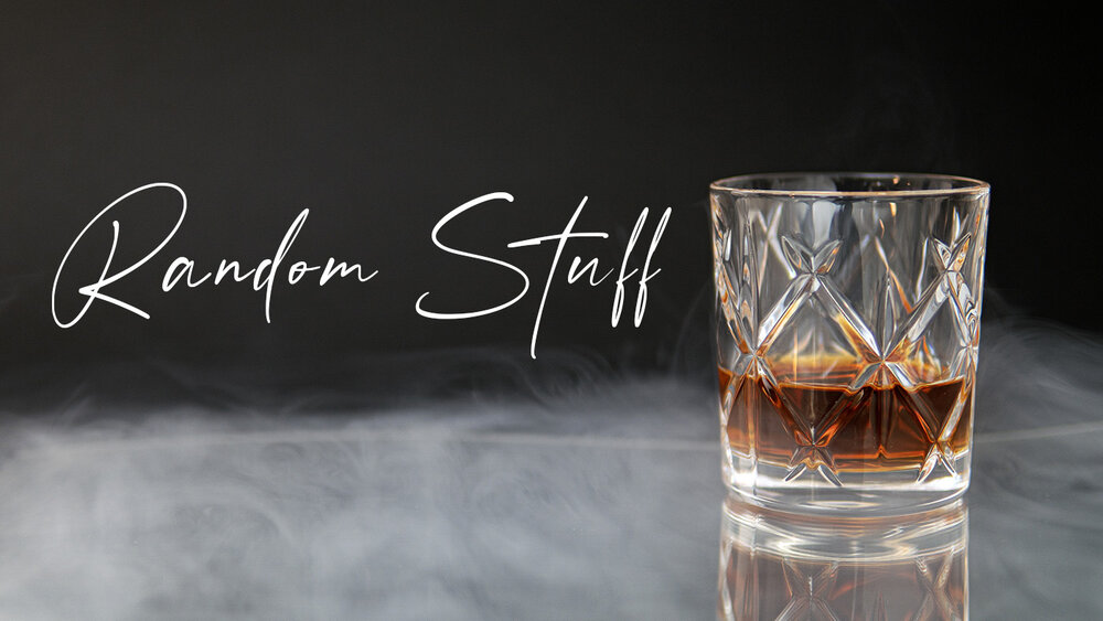 A Glass of Whiskey with smoke in the background and the words: Random Stuff.