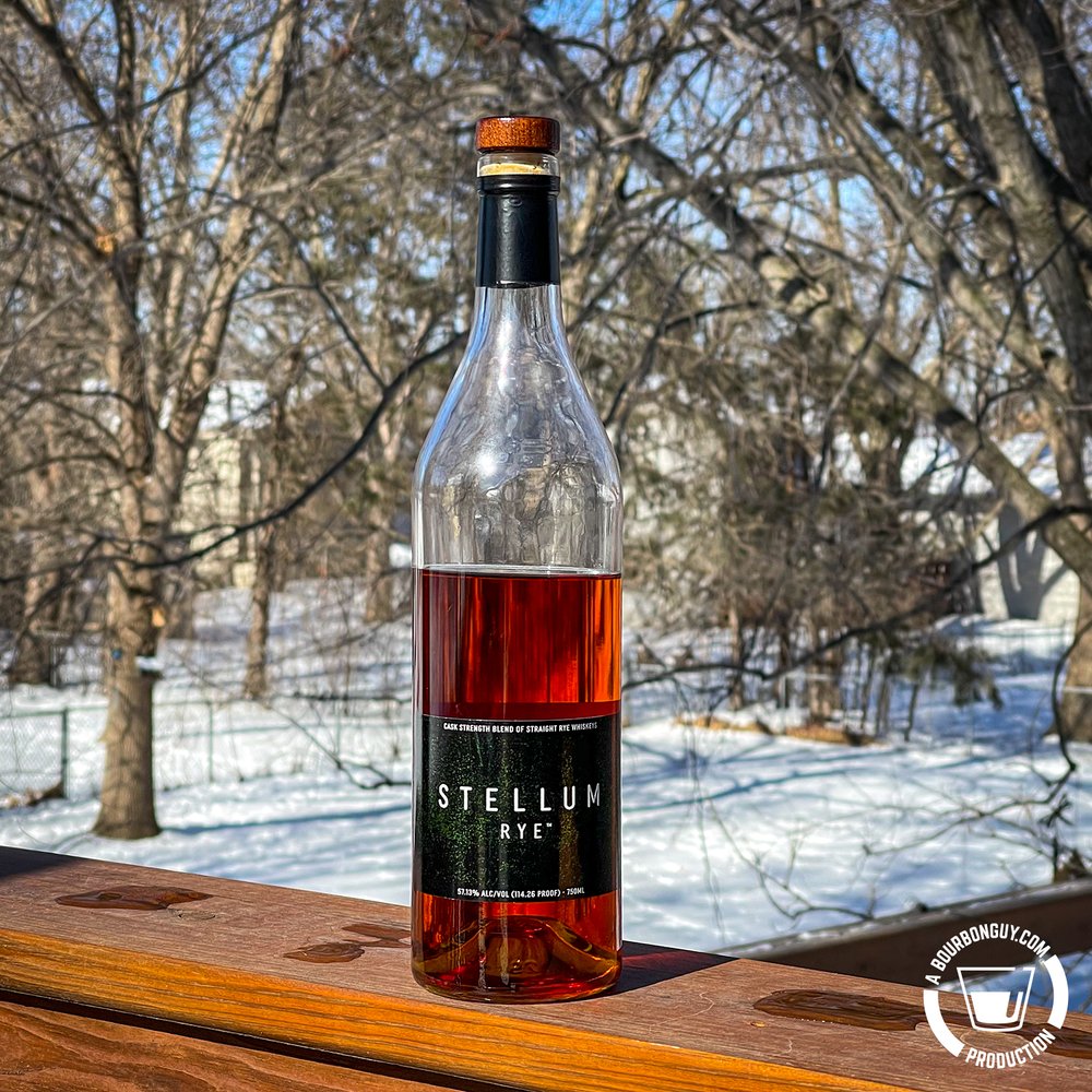 IMAGE: A bottle of Stellum Black Rye sitting in the afternoon sunlight.