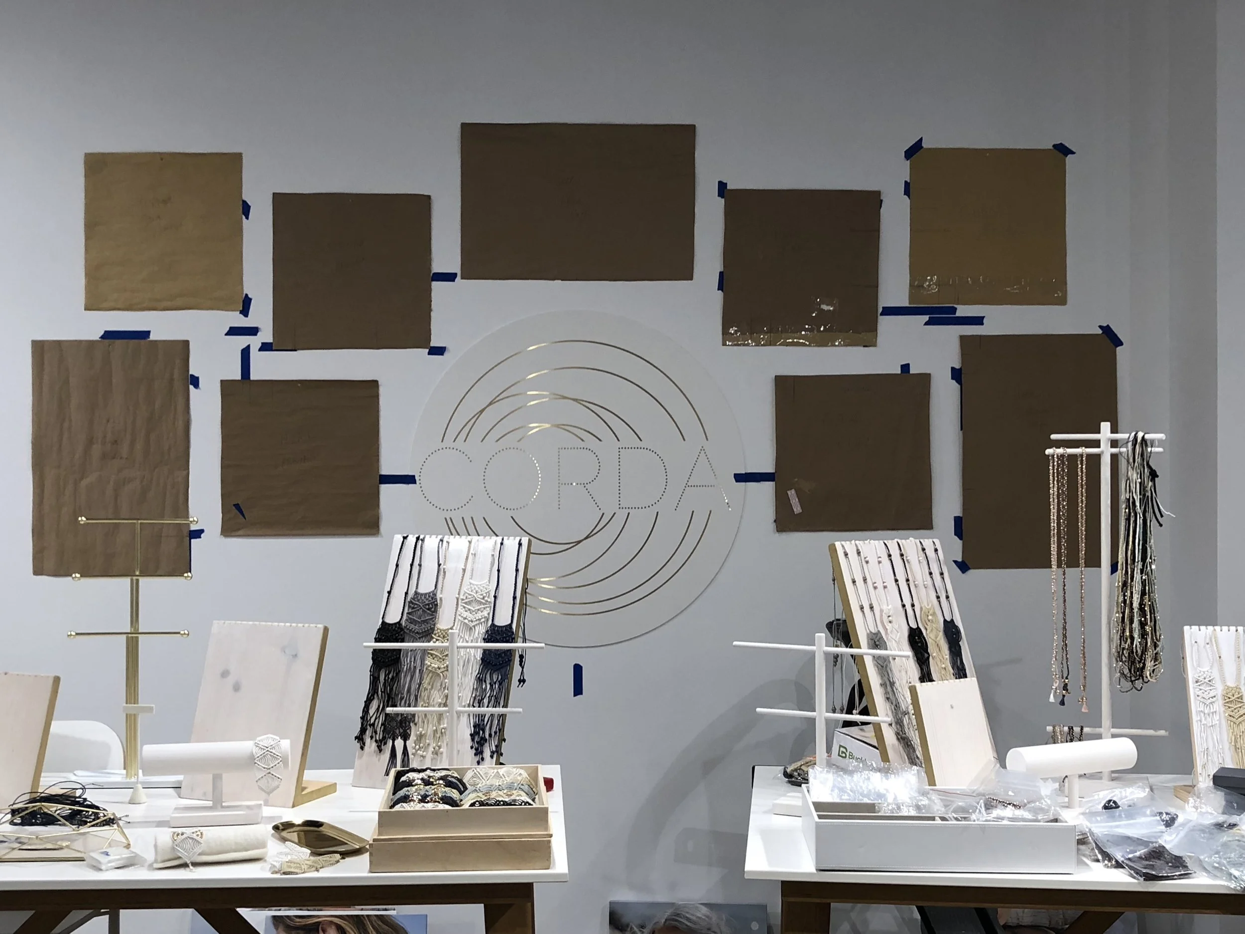 Setting up our wall at the show - we used an old Martha trick!
