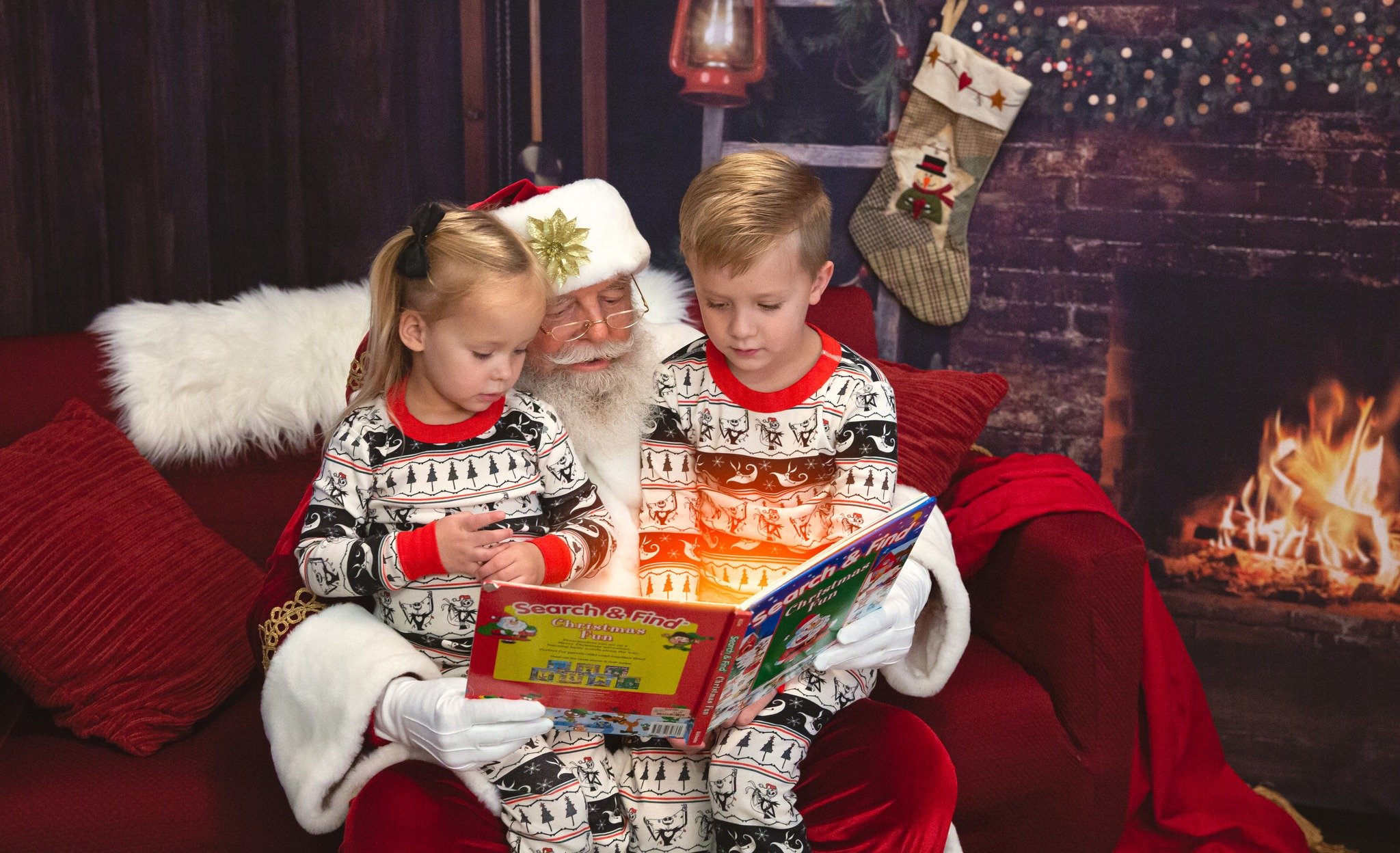 A magical Christmas moment captured during a Santa session in Gilbert, Arizona. Perfect example of a unique, storybook-style portrait by a Gilbert Arizona child and family photographer.