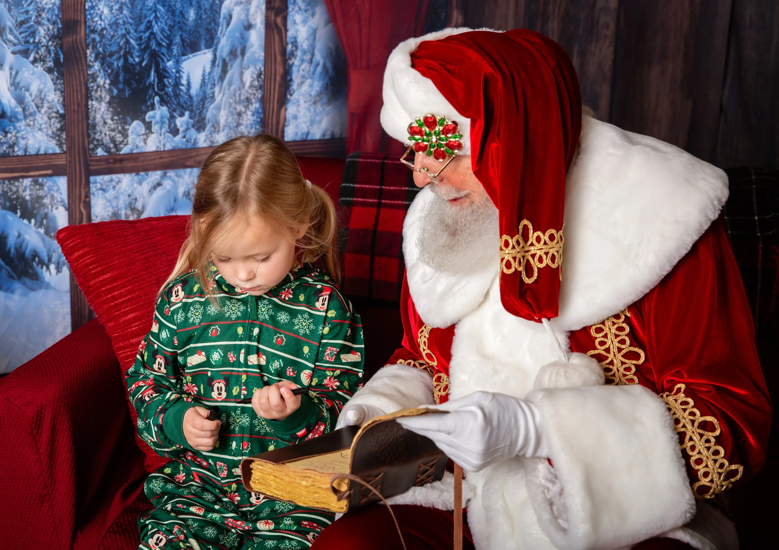 A magical Christmas moment captured during a Santa session in Gilbert, Arizona. Perfect example of a unique, storybook-style portrait by a Gilbert Arizona child and family photographer.