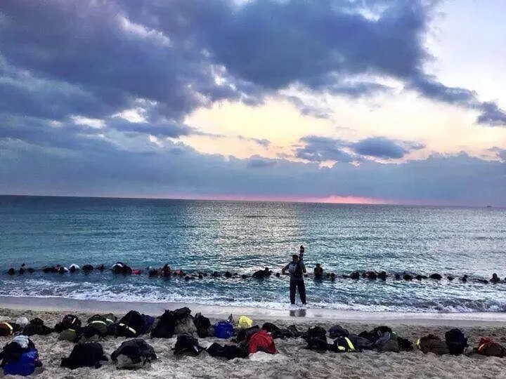 Fun in the ocean at dawn! I'm #5 or #6 from the left... I think. (photo by Chris Strasser)