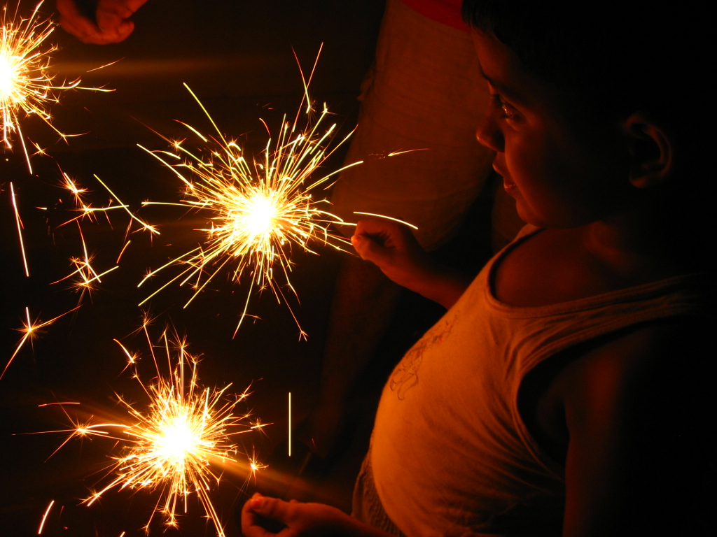 Boy_with_sparklers_-_Diwali.jpg