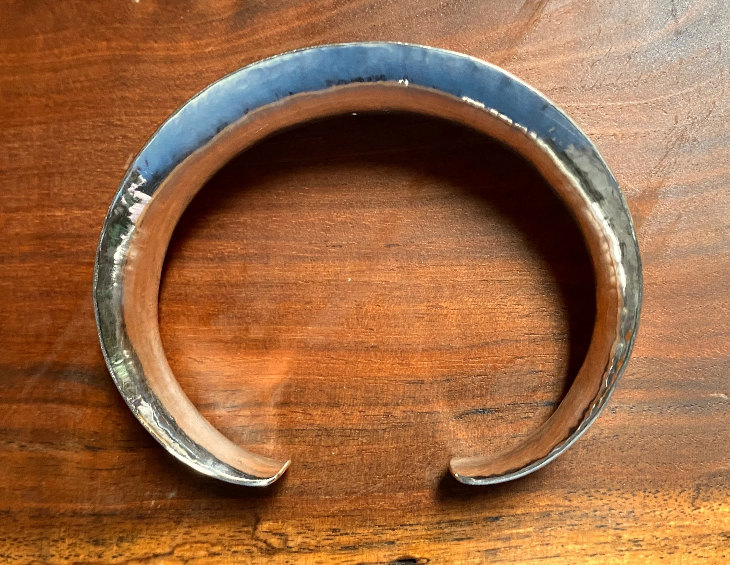 Anti-clastic Bangle