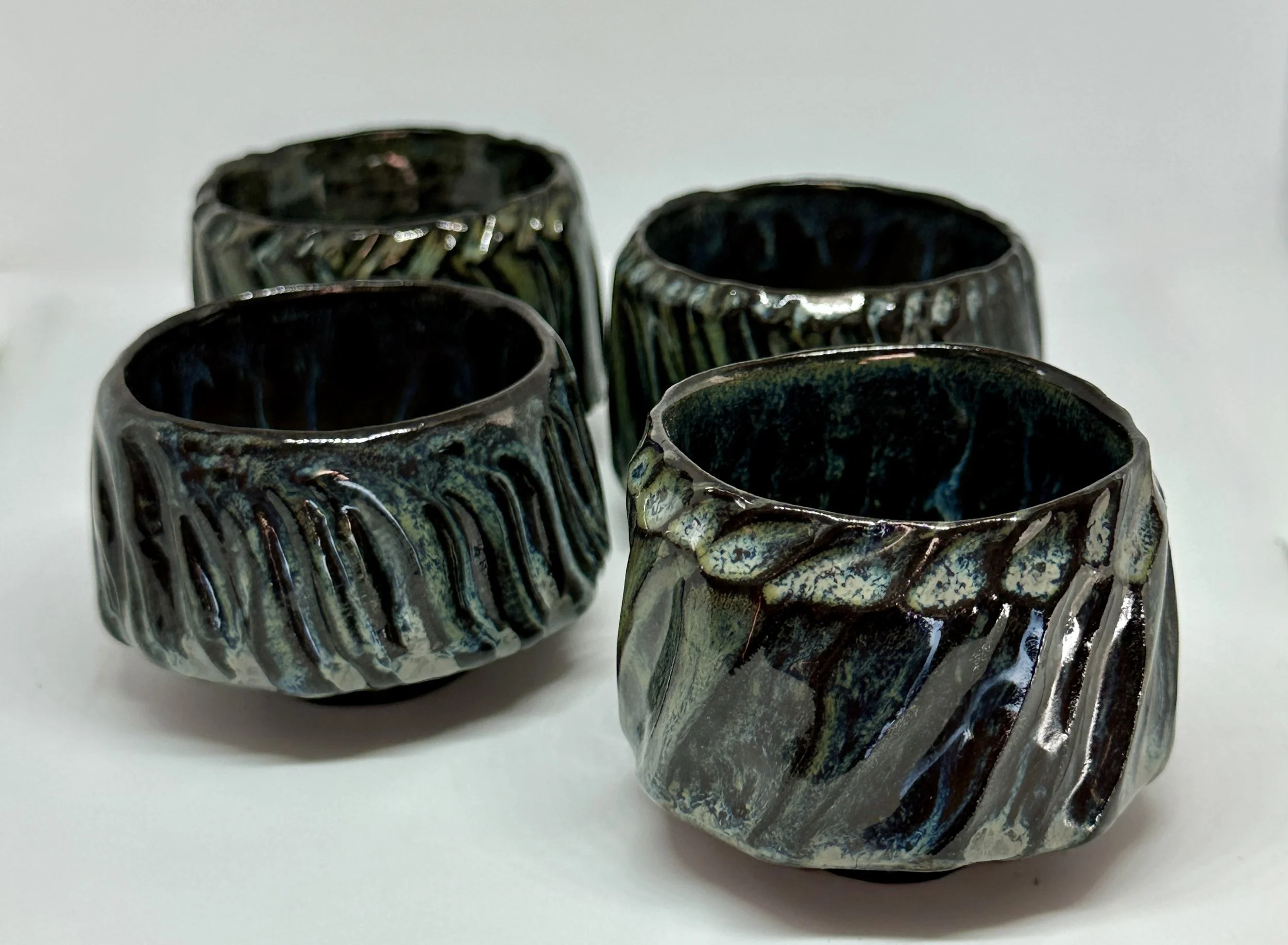 carved ceremonial tea cups