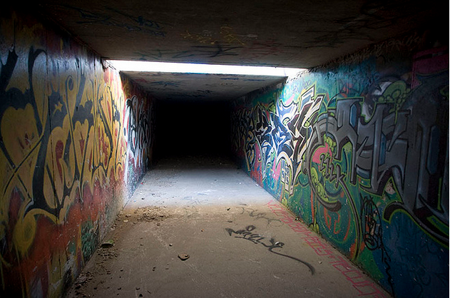 Graffiti adorned walls in a normally pitch black tunnel system under Caesars Palace, Las Vegas