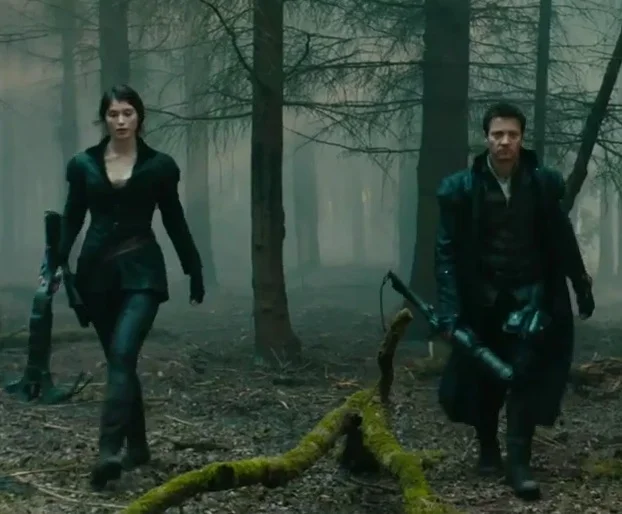 The dynamic duo enjoying a walk in the woods.