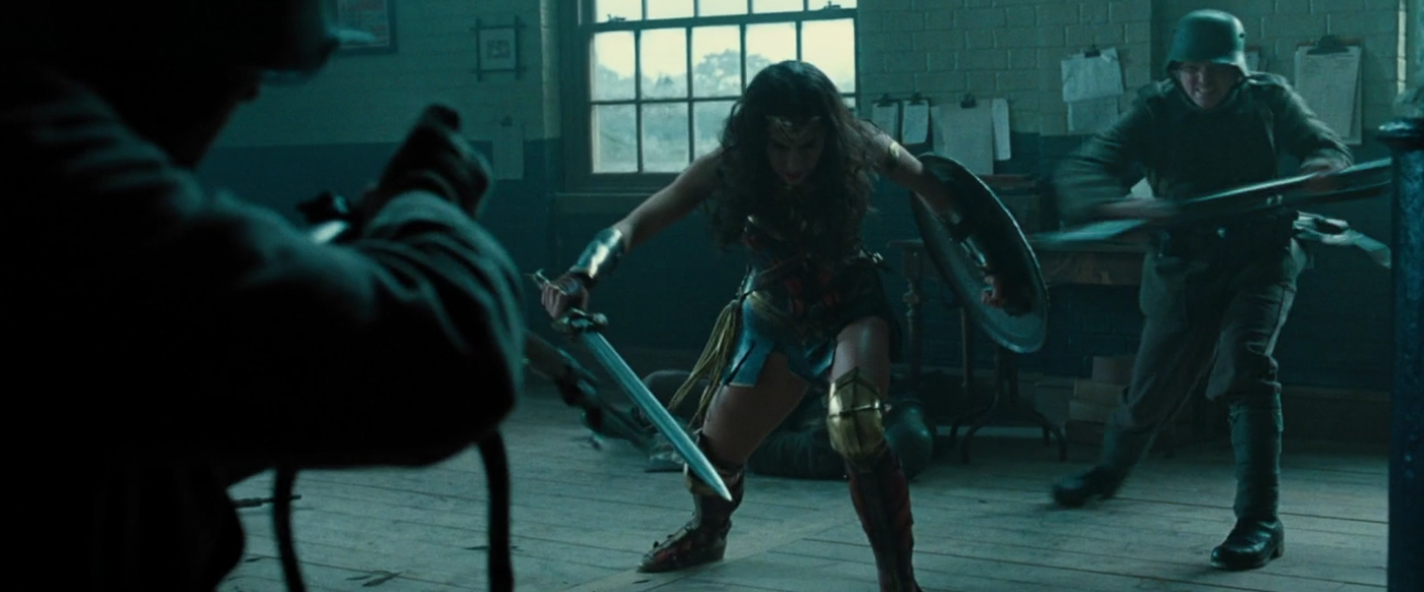 The guy in the back looks undecided between "attack!" and a new pair of pants.