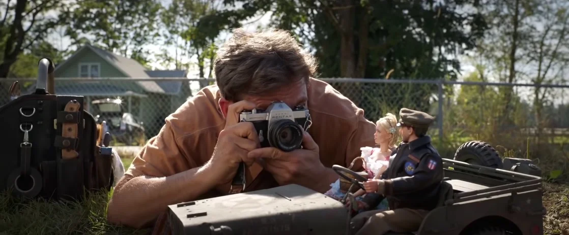 A man and his dolls.