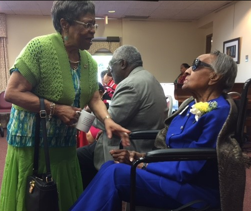 Ruby Ricks visiting with honoree Dema nappier