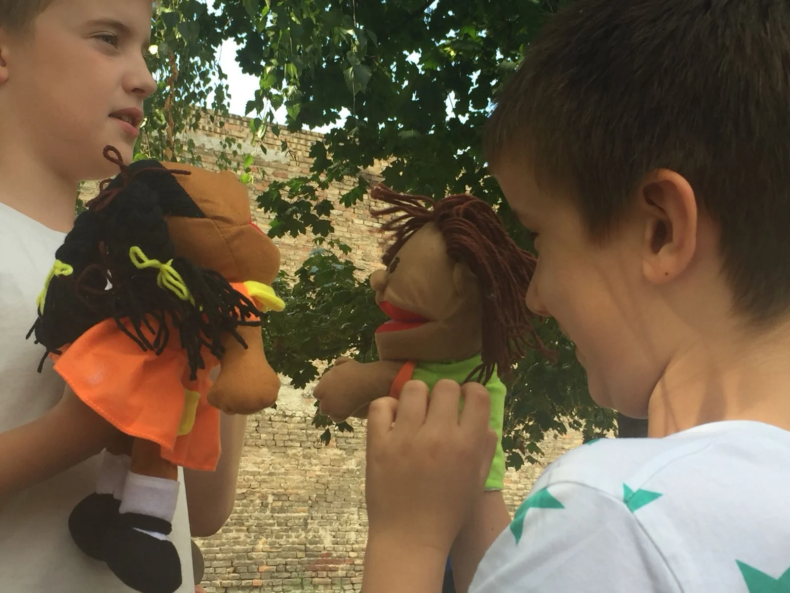 Missionary Jones sent these pictures to show that the children continue to enjoy playing with the puppets.