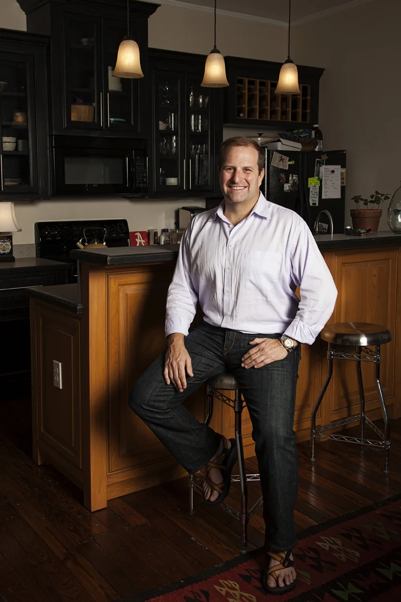 Kinnon at his kitchen in his renovated Midtown Mobile, AL home | Todd Douglas Photography