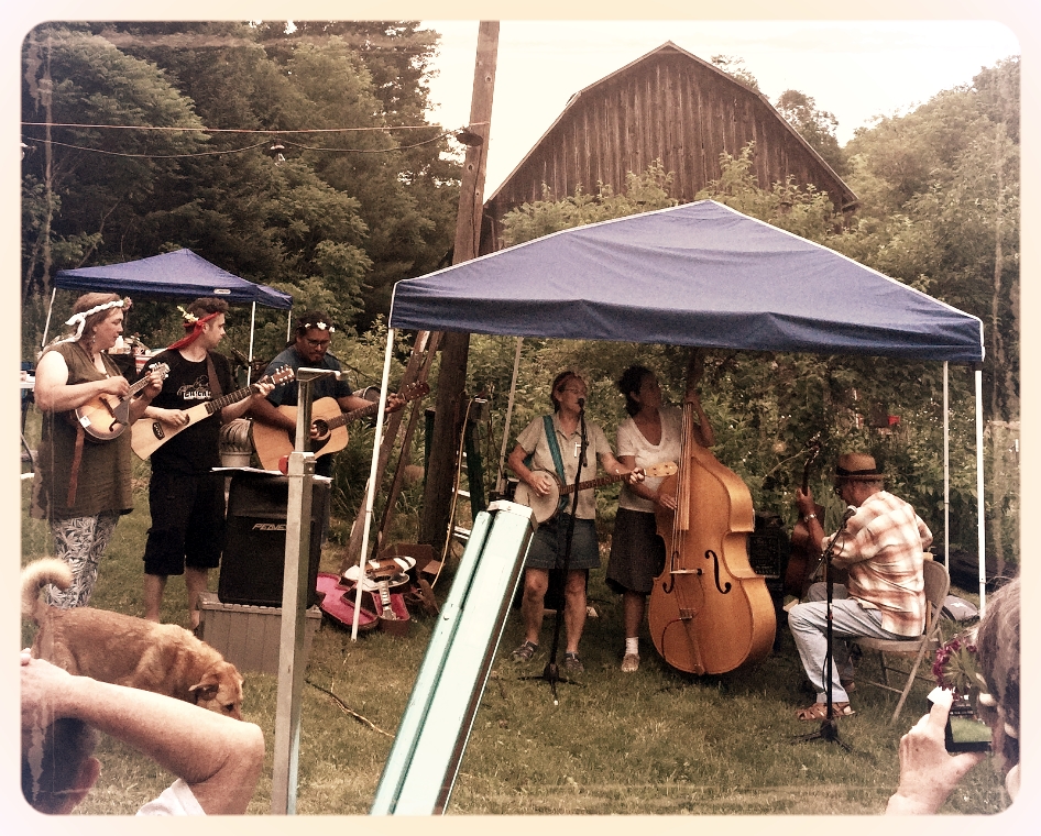 julia and Mauricio's Farm Wedding. Zack and the newly weds join the band in front of the old barn.