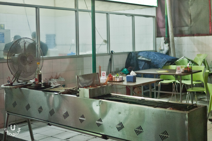 The grilling/roasting station is located in front, near the entrance, explaining fragrant lamb aroma pervading the entire area.