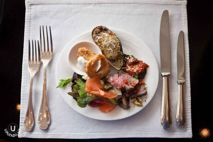 My plate:
smoked salmon & capers salad, beef crudo, aubergine, frito misto, and baked
clam.