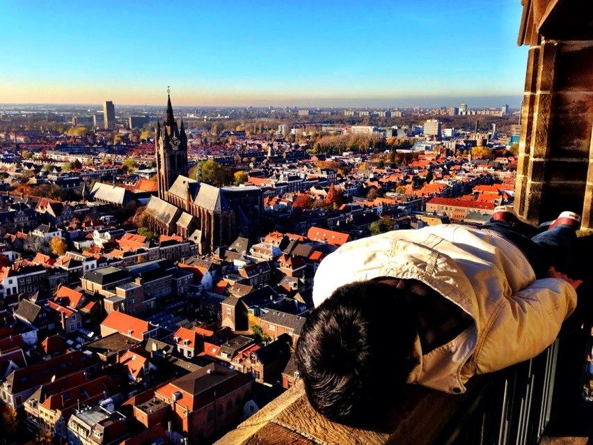On top of Delft (at Nieuwe Kerk Delft). This is also his current Facebook photo cover..