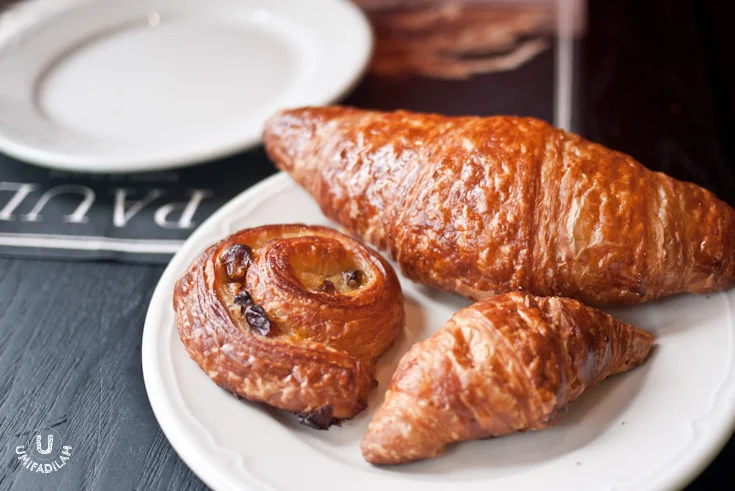 Plain croissant (regular and mini version), and mini Escargot aux raisins .