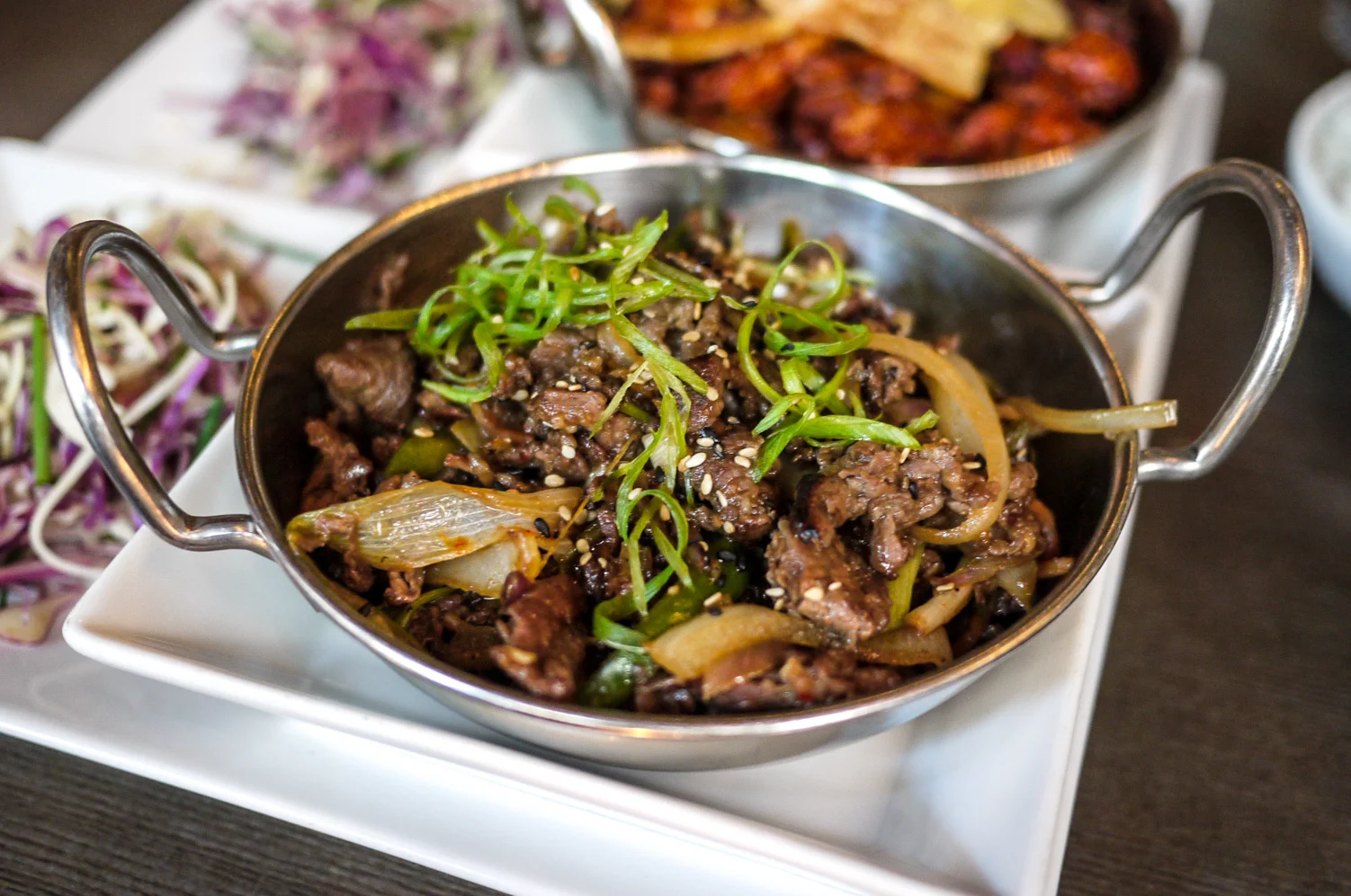 Bulgogi Pot ($14) - soy-garlic marinated beef ribeye, mushrooms, local greens served with white rice and salad. It was tasty and you just know that the beef quality they're using is just perfect for Korean BBQ. Good for sharing too!
