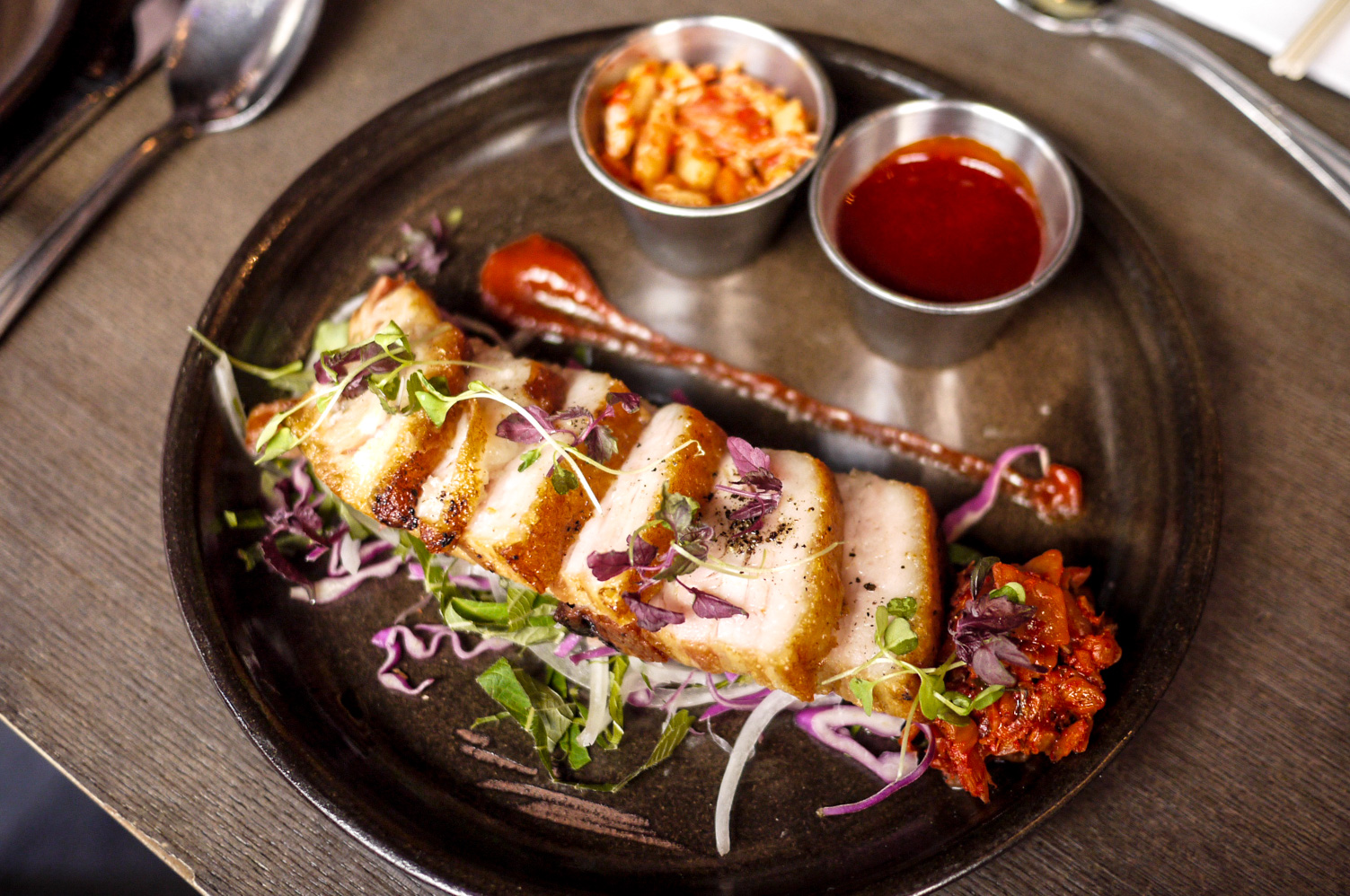 Berkshire Pork Belly Confit ($18) - Heritage pork belly, kimchi, scallion salad.