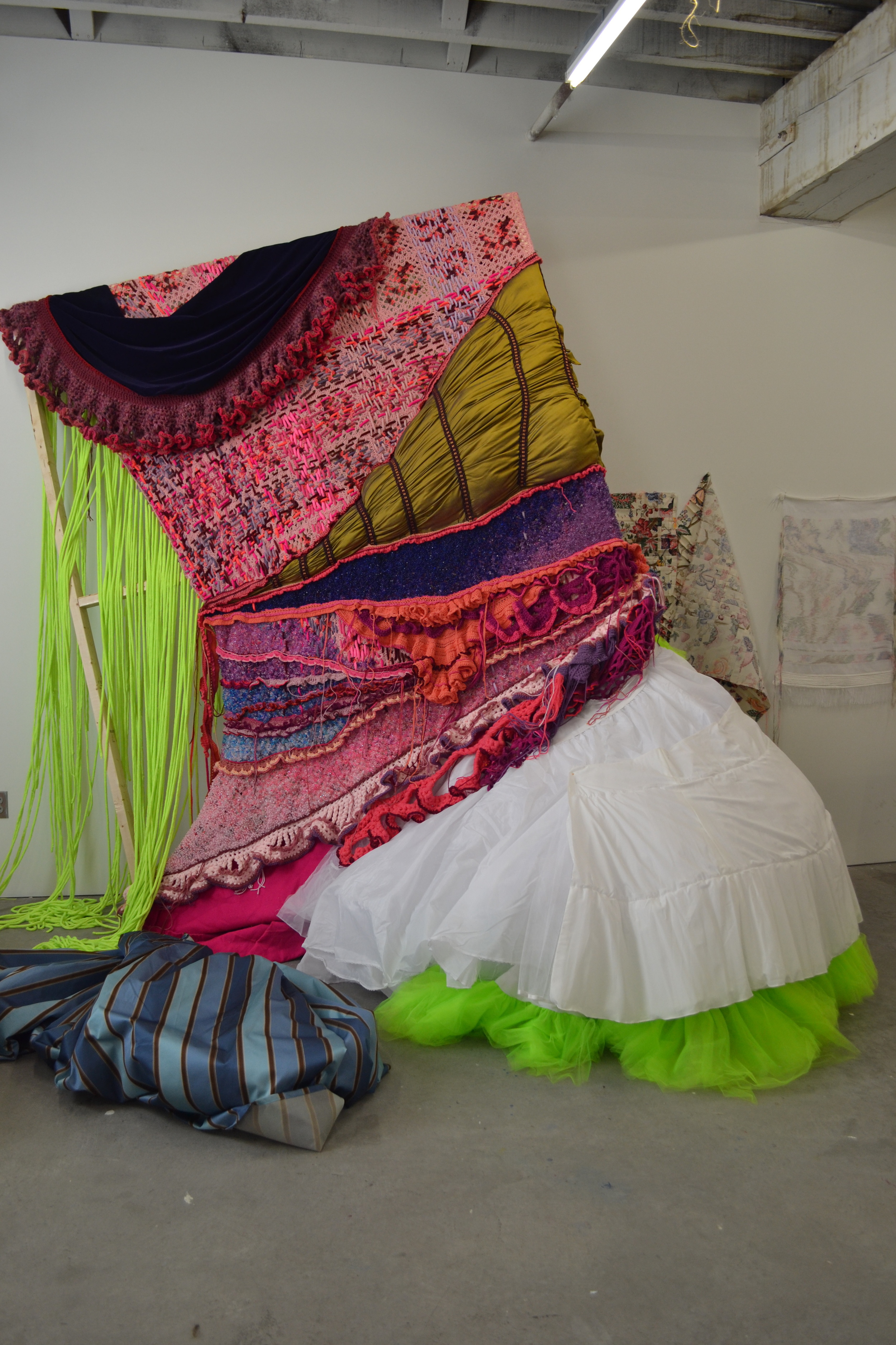 "lady of leisure" app.13hx10'wx6'd, recovered afghans, beads, acrylic yarn, fabric, stretcher frames, sequins  in the studio at Bemis Center for Contemporary Arts Omaha,NE