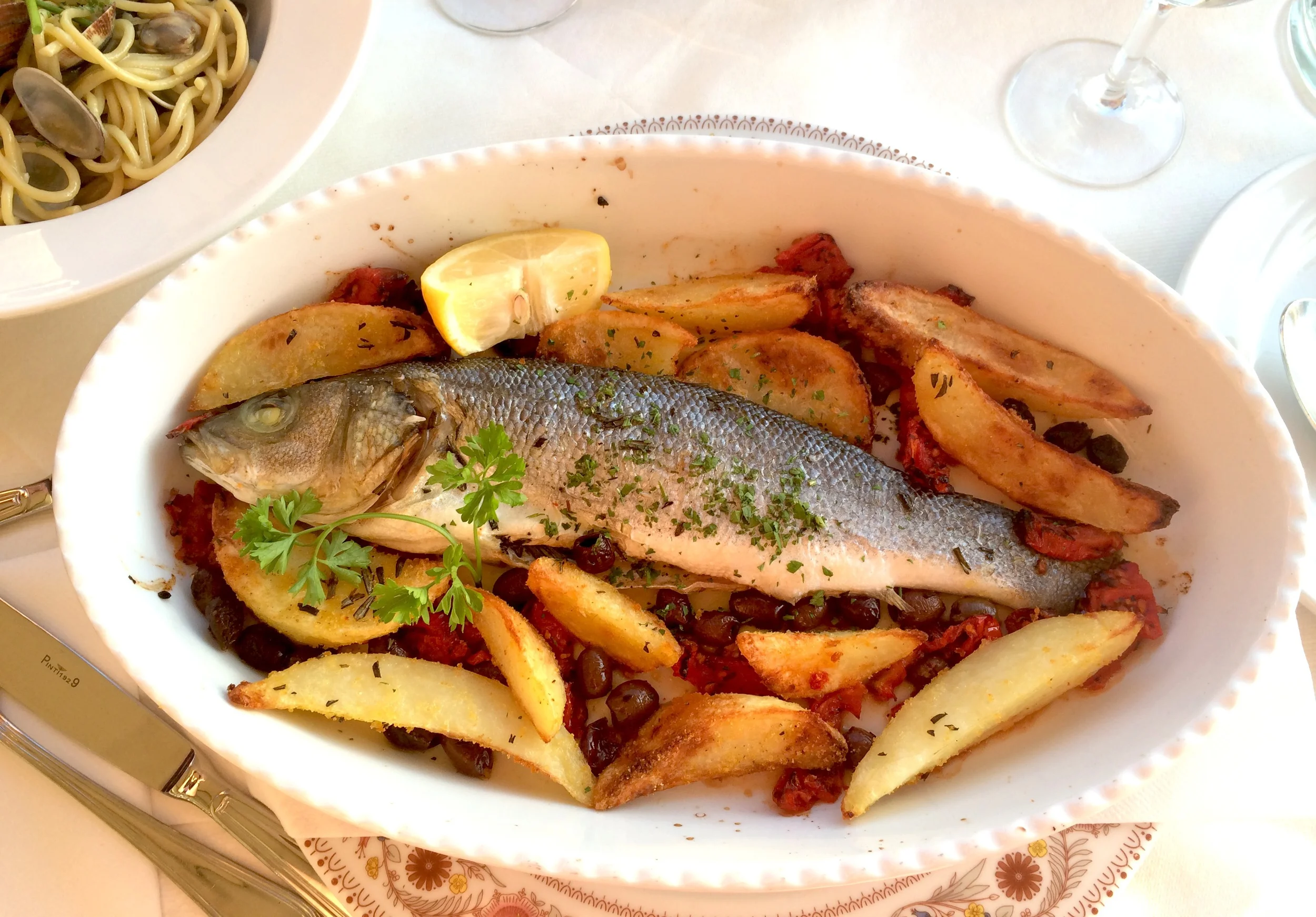My sea bass roast with potatoes and sun-dried tomatoes