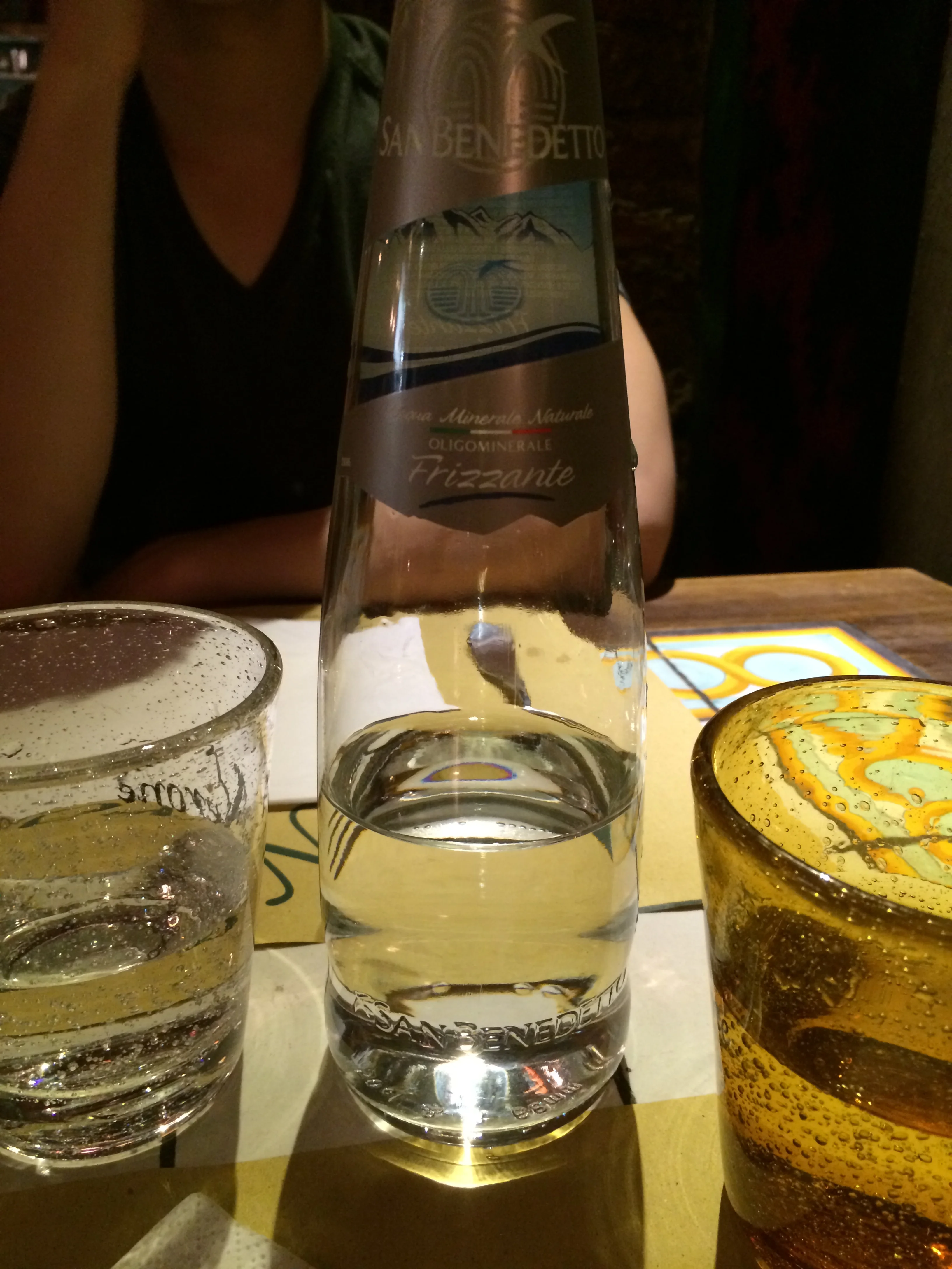 "Frizzante" is the soda water. And those glass tumblers are Italian standard at restaurants, aren't they pretty?