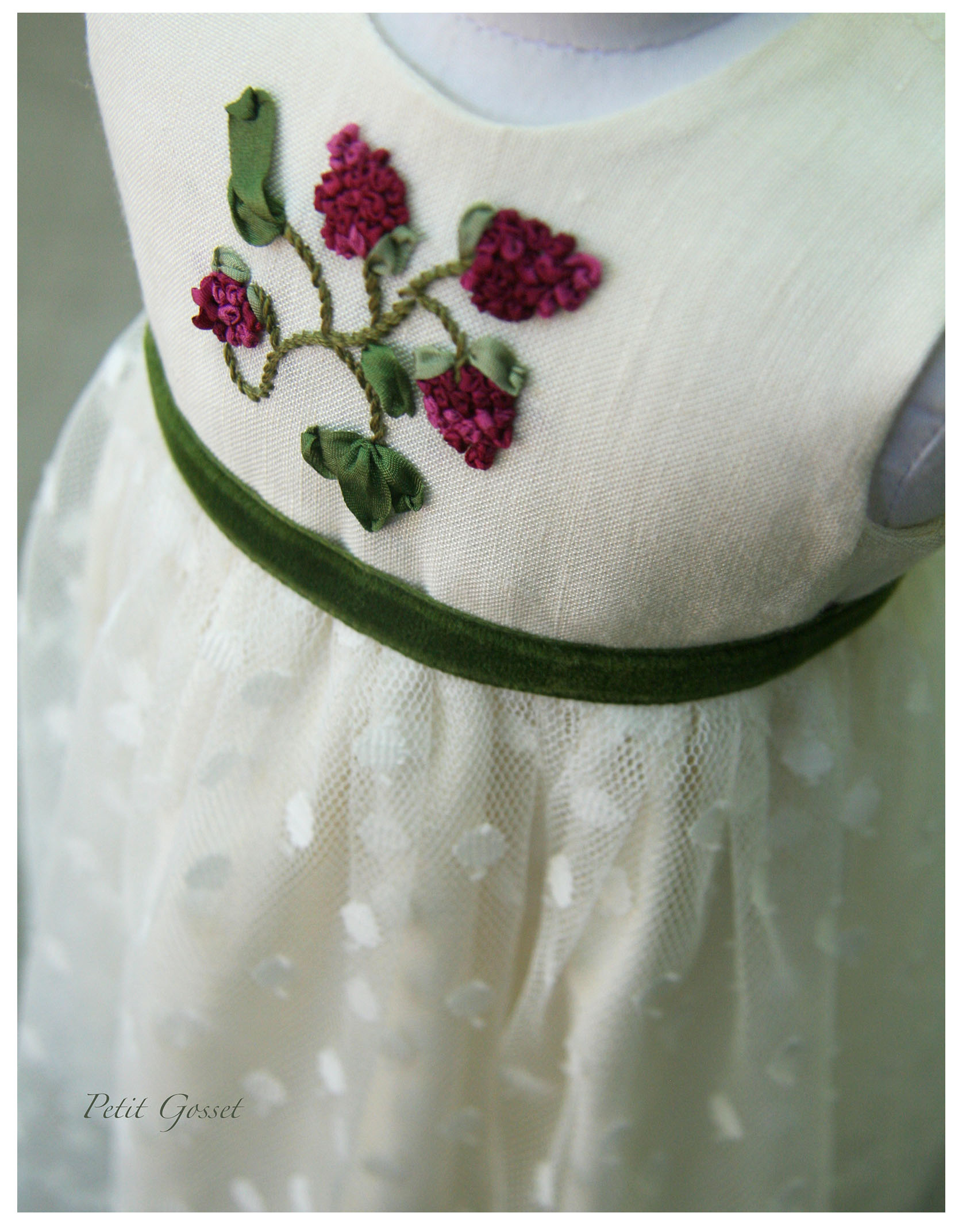 with beautiful silk ribbon embroidery and a velvet sash. Made to fit an 18" doll.
