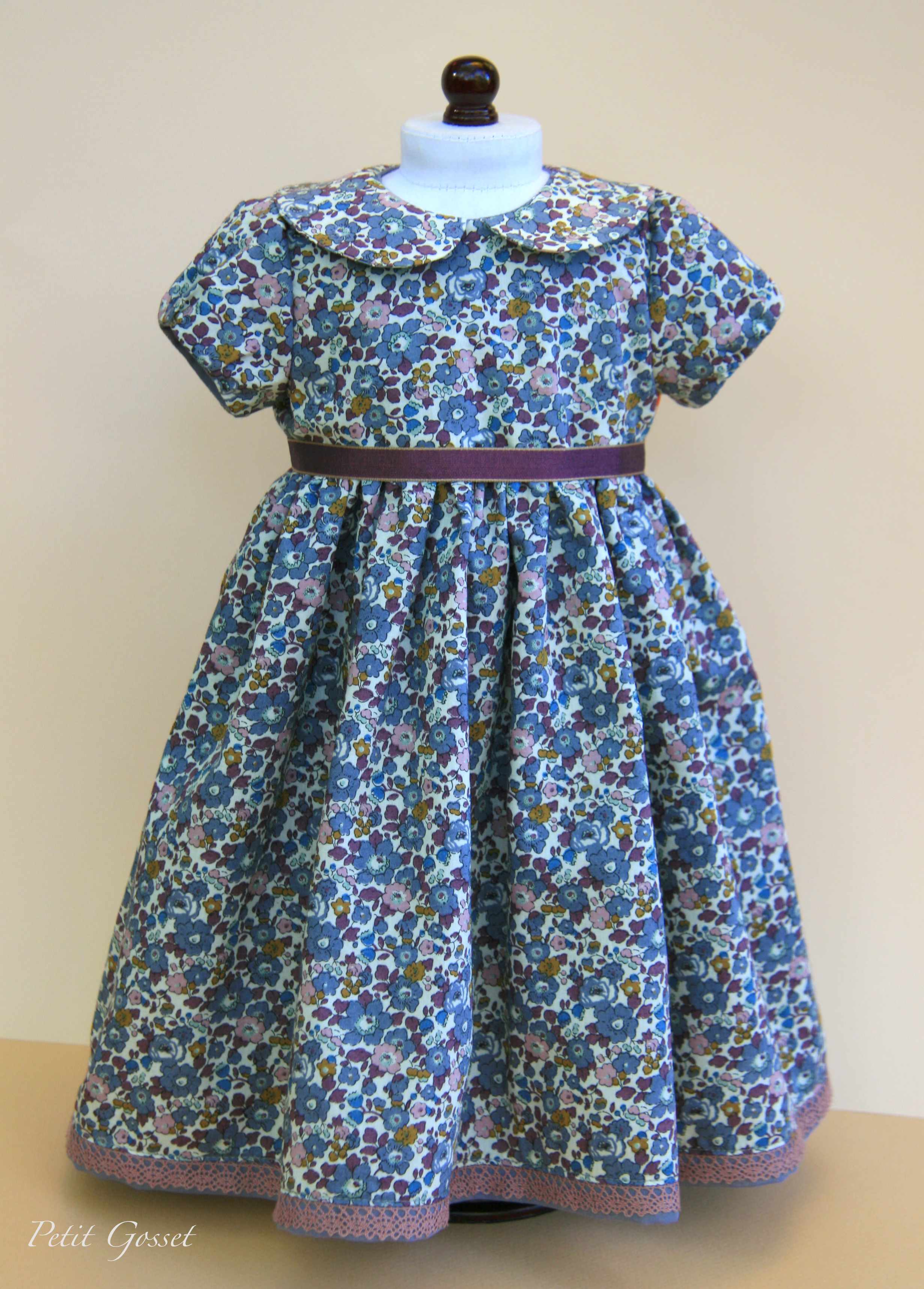This beautiful floral dress is made with Liberty of London cotton lawn and fully lined with Swiss cotton voile. Opens in the back with nickel-free snaps.
