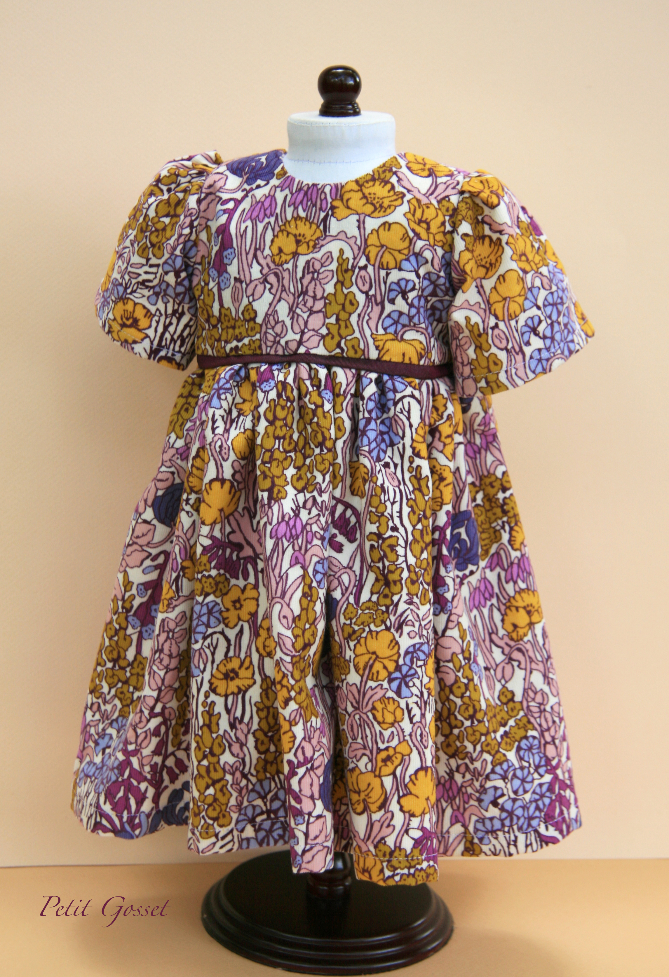 Gorgeous Liberty Print corduroy dress features opening in the back with nickel free snaps