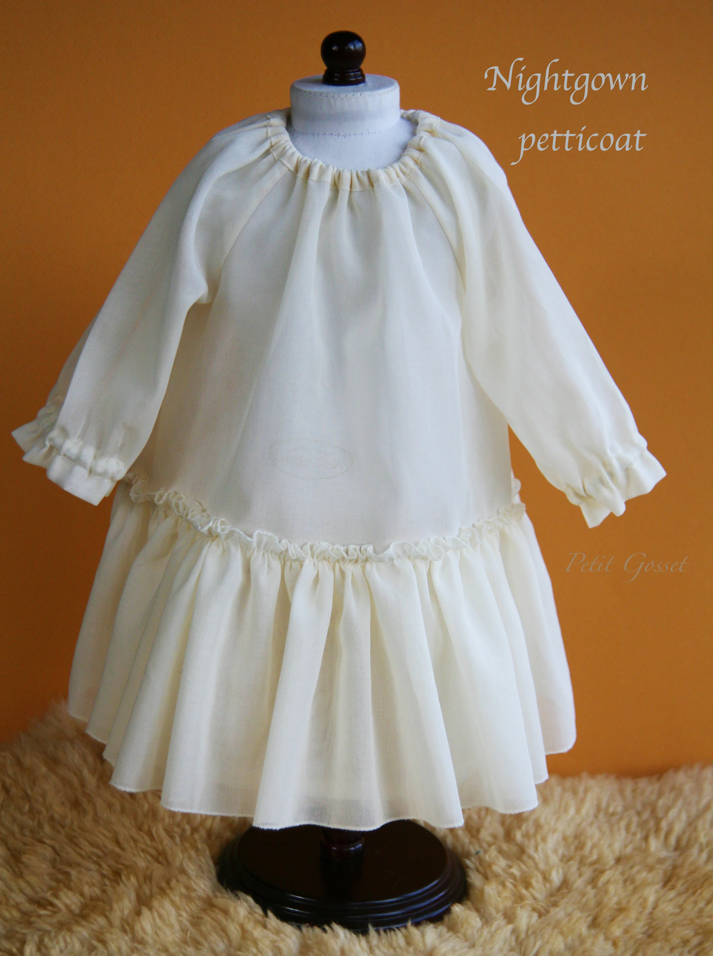 A nightgown petticoat, crafted with Swiss semi-sheer voile. Will fit 18-20" doll.