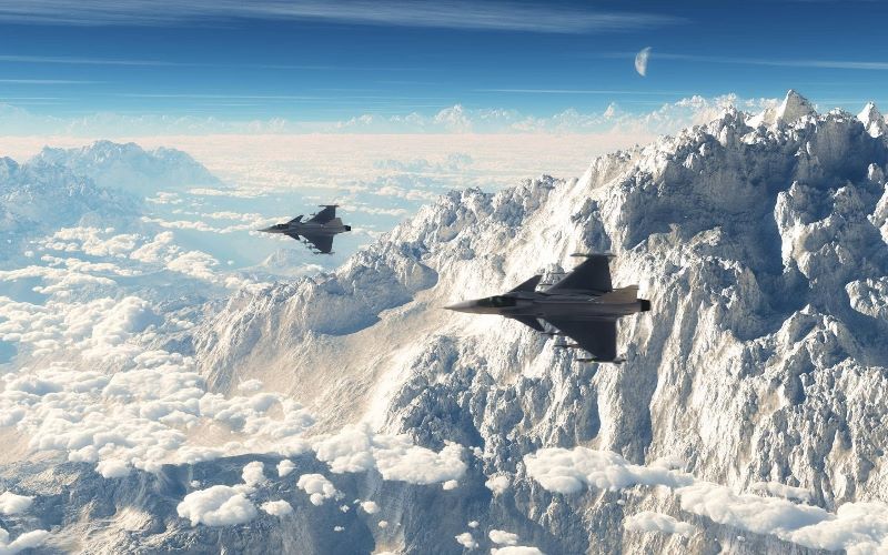 Beautiful view: two Saab JAS 39 Gripens in flight. btw, also in the photo, in the background: the Swiss Alps.