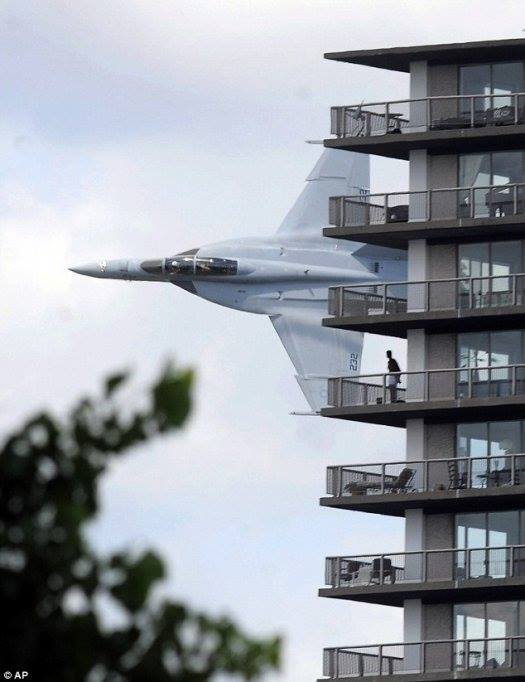 An F-18 pilot, flying past his apartment, sees a stranger in boxer shorts on the balcony. How do you think the pilot will respond?
