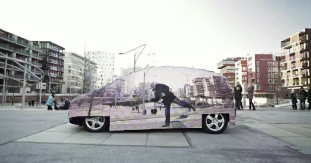 Taking the principal that to see through something you need to see what's behind it, they covered the driver's side of the car in mats of LEDs, and mounted a digital SLR camera on the opposite side of the vehicle. READ MORE