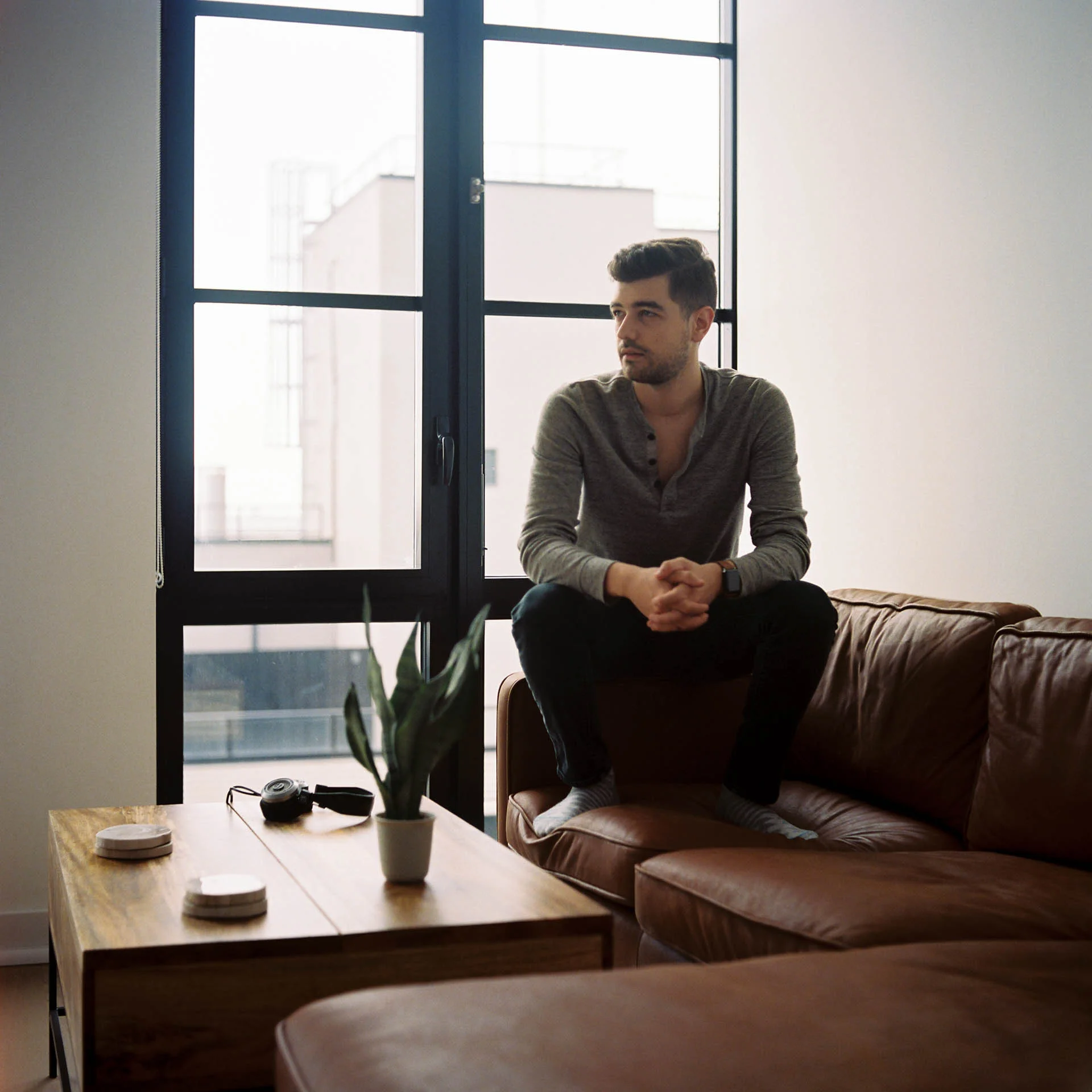 Jonathan Grado Film Portrait on Leather Couch