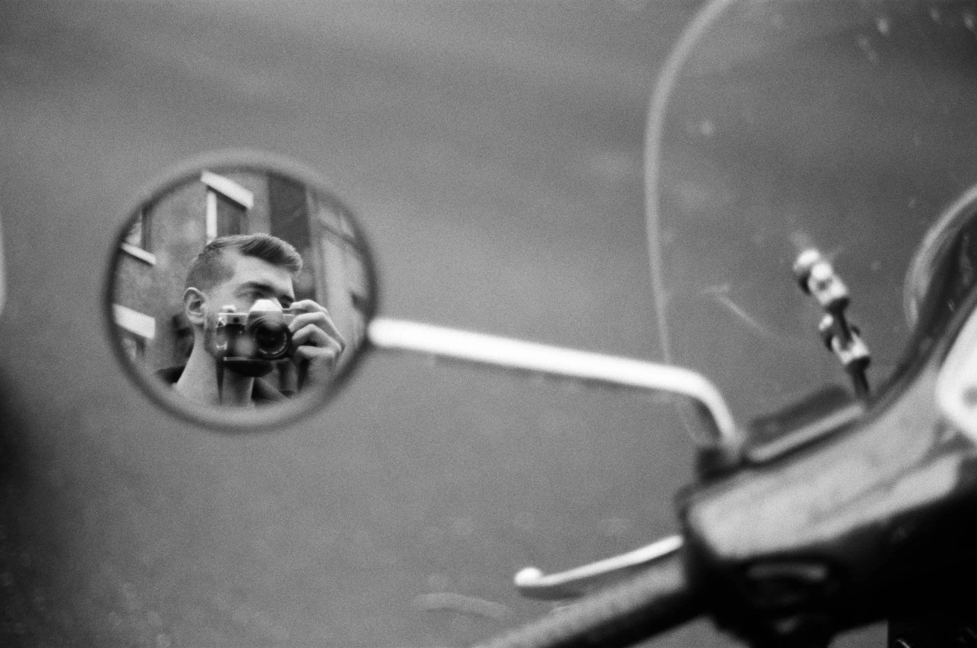 Jonathan Grado in Motorcycle Mirror Selfie