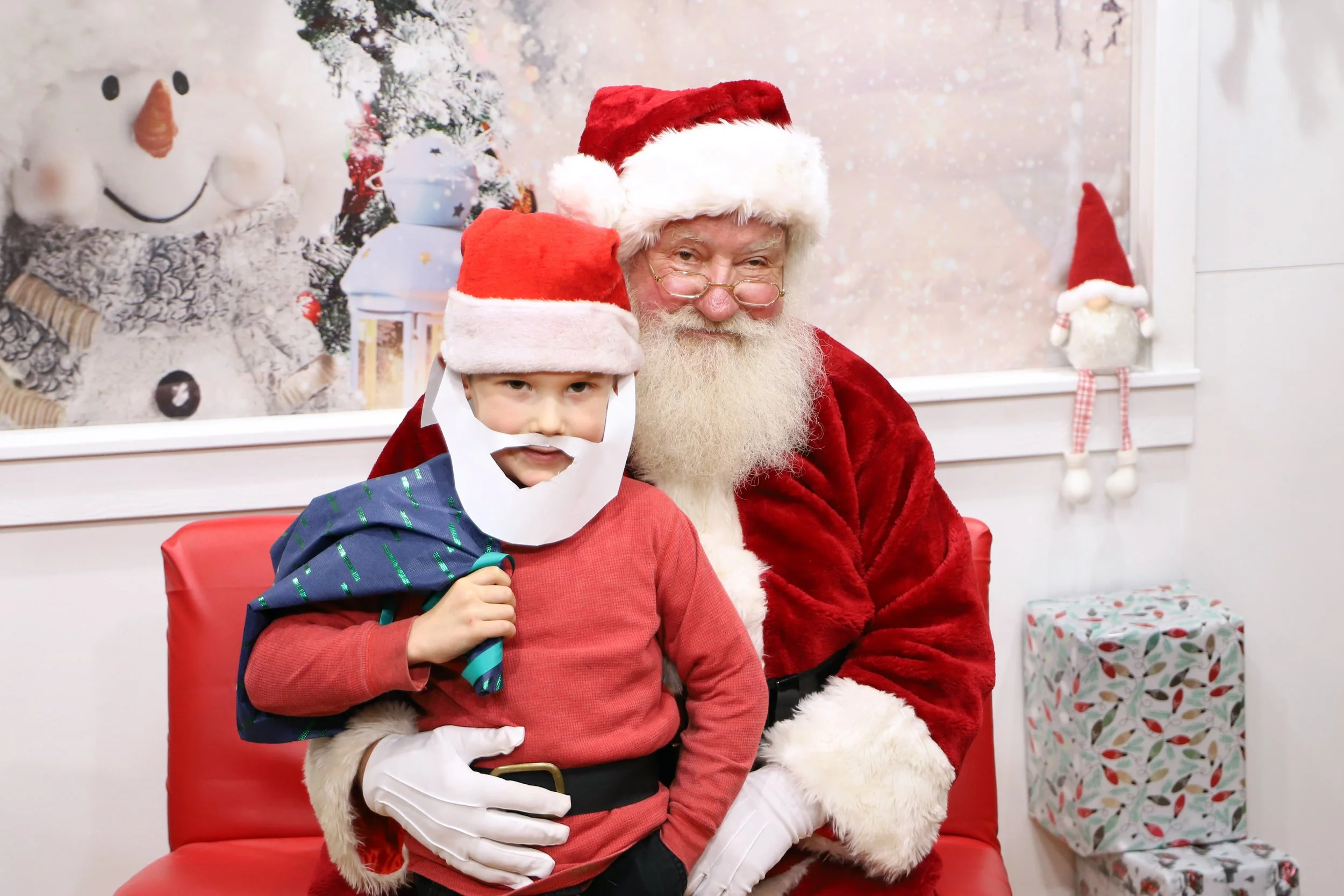 PHOTOS with a Very Jolly SANTA