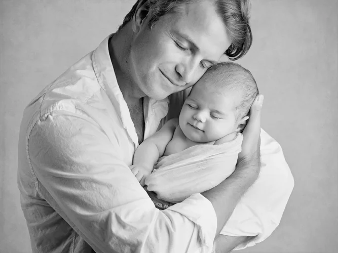 dad with newborn baby portrait