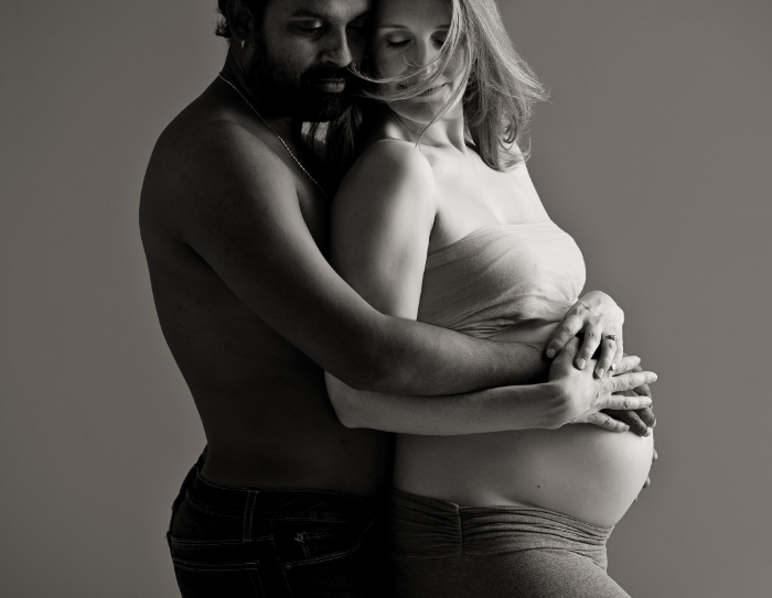 pregnancy and maternity portrait with couple