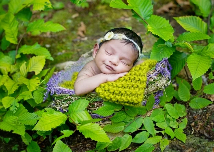 newborn baby girl natural outdoor portrait