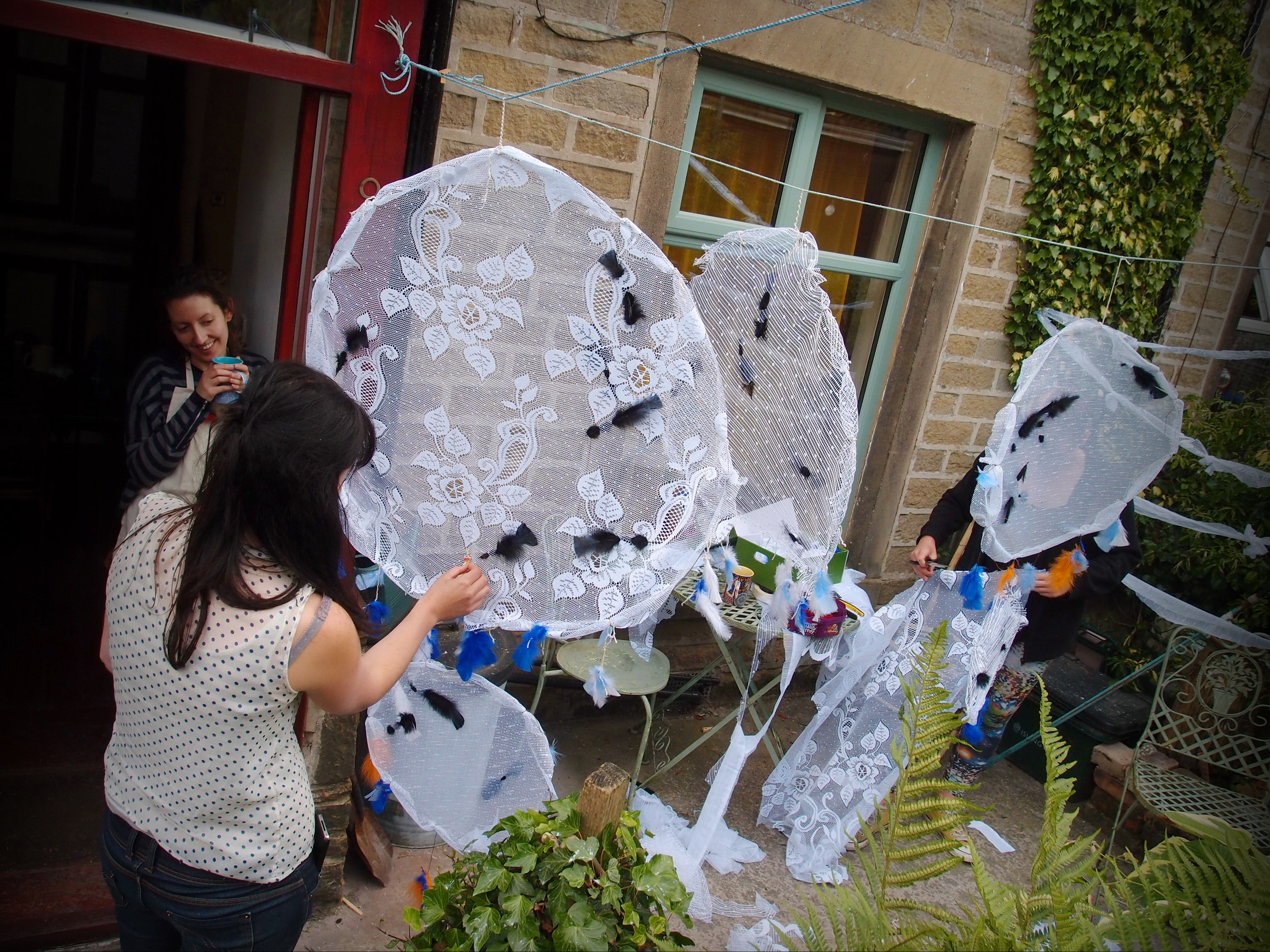 Fellow student Addya Panayiotou, tutor Emma Fisher and myself setting up my installation. Photo by Kay Yasugi
