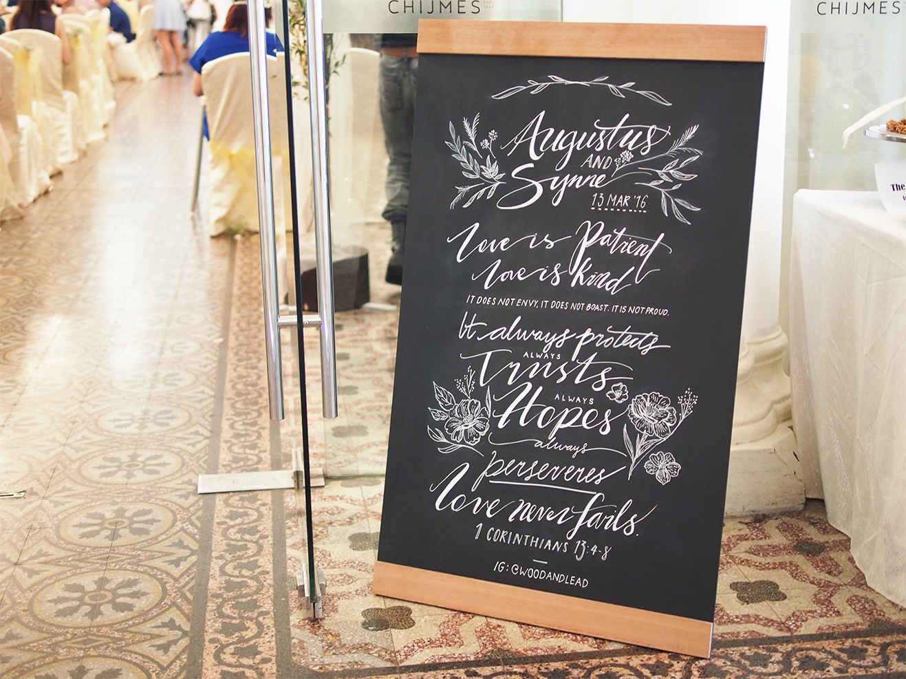 A hand-drawn chalkboard signage for Augustus & Synne's Wedding at Chijmes Hall, Singapore.