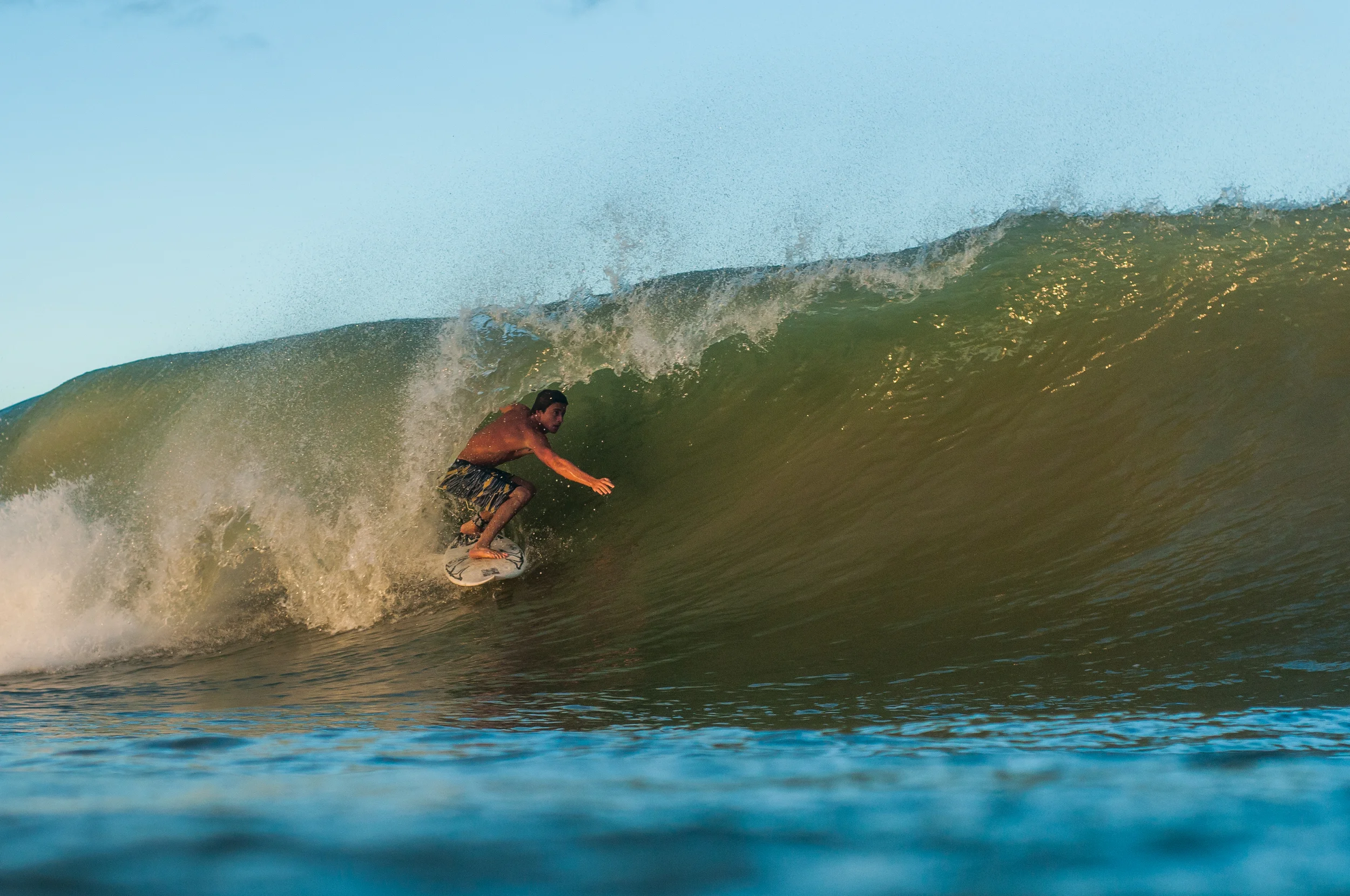 This is one of my favorite images from the whole swell. I'm my eyes it sums it up perfectly. Stoked Danial Calloway snagged this left just before that beautiful light disappeared behind the clouds.