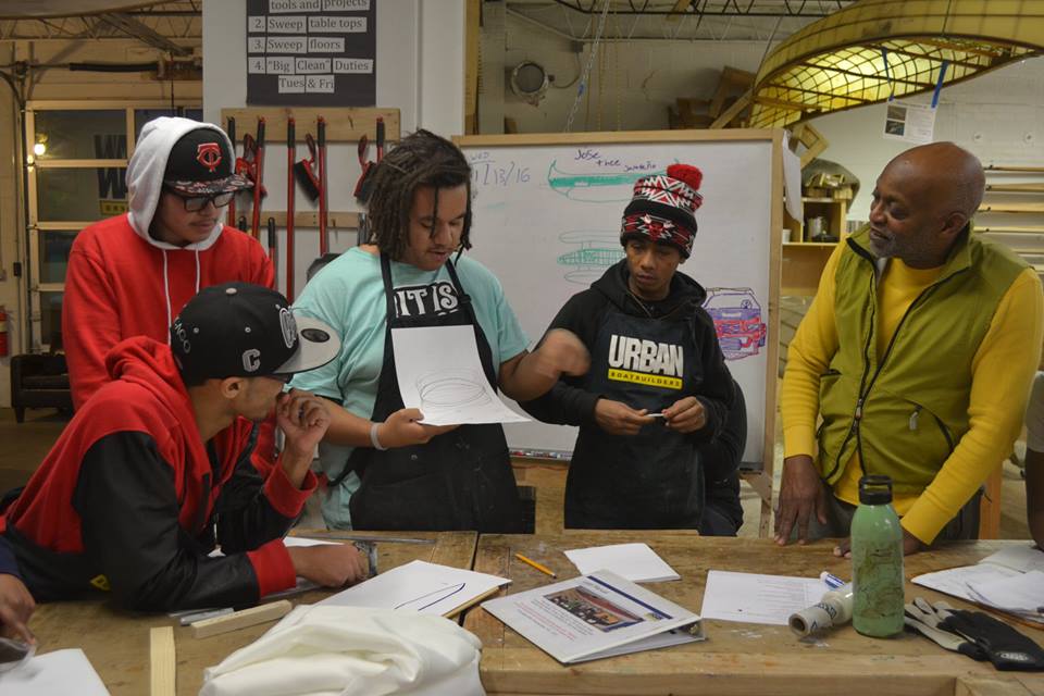 Seitu Jones (right) and Apprentices working on initial designs.