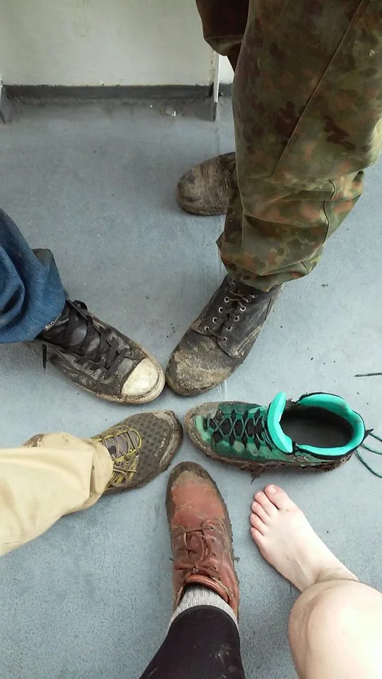 Dirty shoes after slogging through the mud.