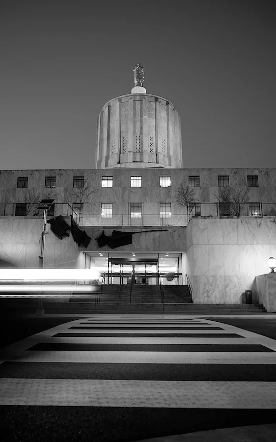 Traffic passes in front of Oregon Capitol Building. Fuji X-E1. 18-55mm.
