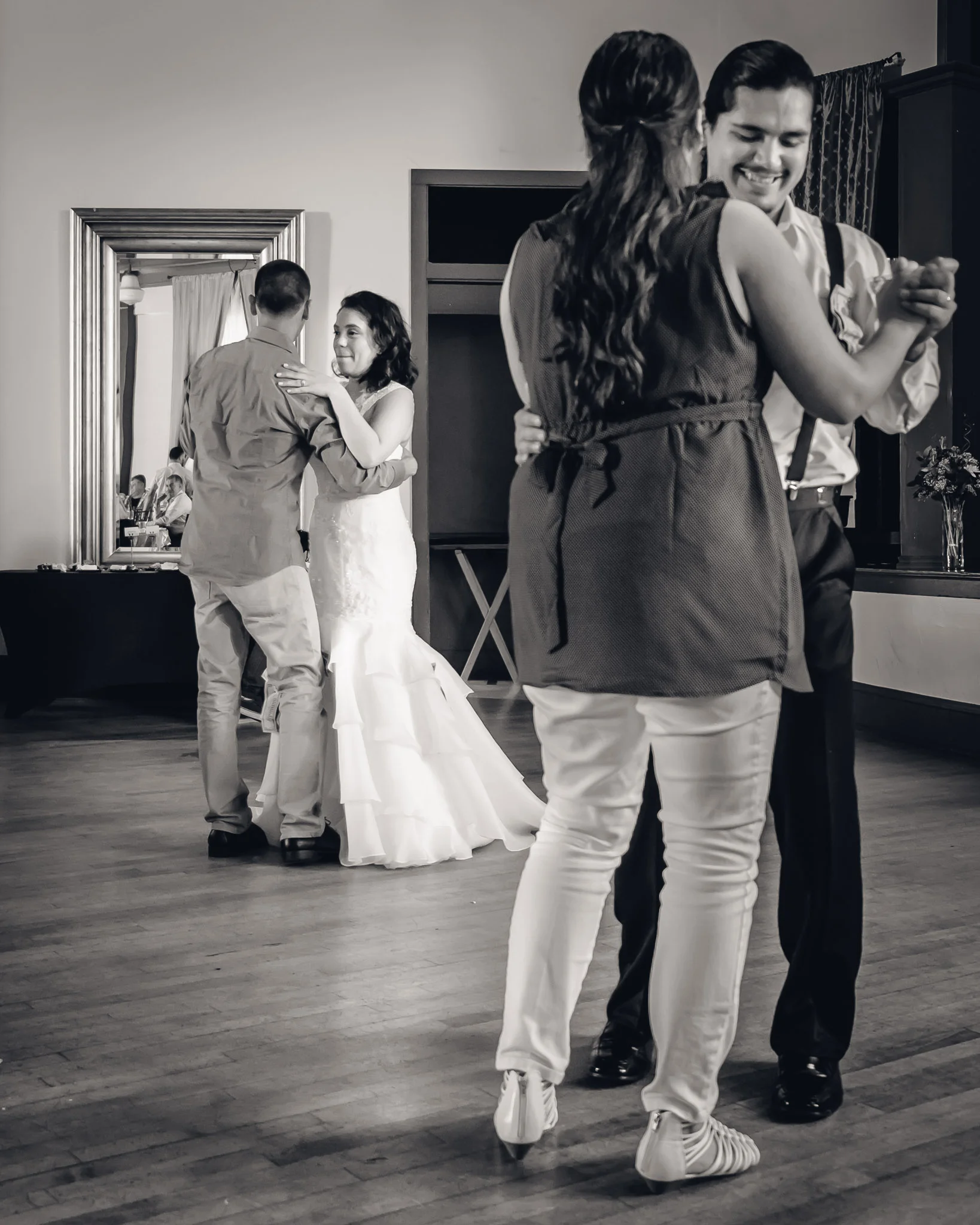 One of my favorites, I love how the eye is drawn from the groom's smile to the bride's emotion. Fujifilm X-T1, XF18-55mm @ 22mm, f/3.2, 1/50s, ISO 1600