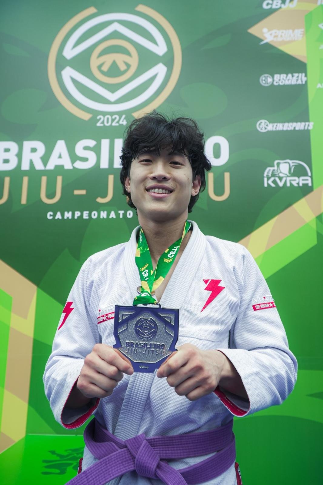 DiSalvo Performance Training alum, Robin Hwang, displaying his silver medal from Basilieros in 2024