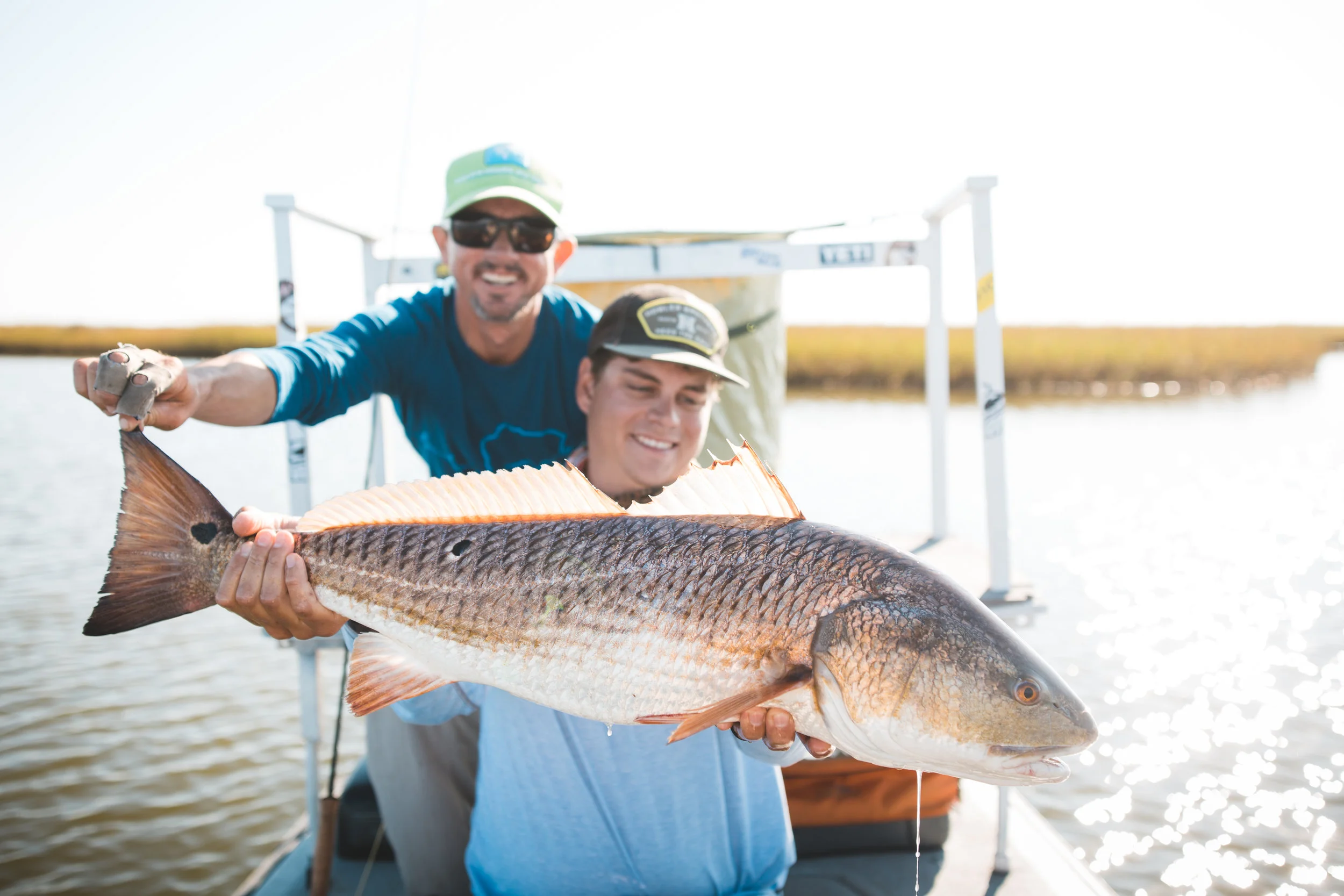 A rare shot of me actually holding a fish that I CAUGHT!