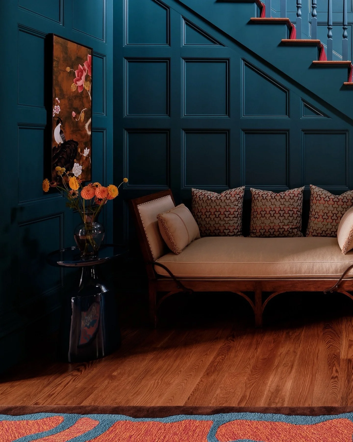 Rich. Color. Flow.
Statement entry way flows into a classy colorful living room. Custom designed rugs ground the spaces. Illuminating gold wallpaper inset in the bedroom rounds out this rich project by @caligariwilliam 
#customrugdesign #entrywayde