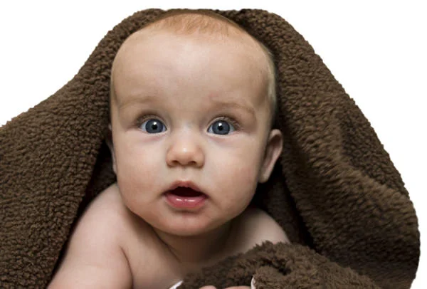baby under blanket